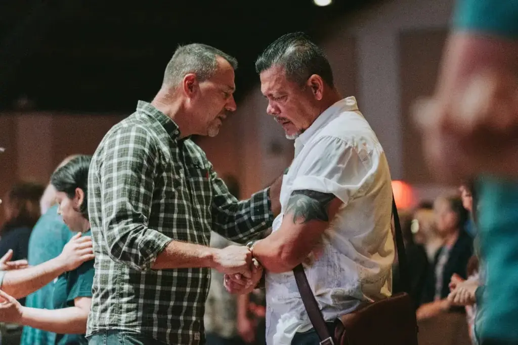 Christian Life Fellowship Cape Coral FL Man praying for another man
